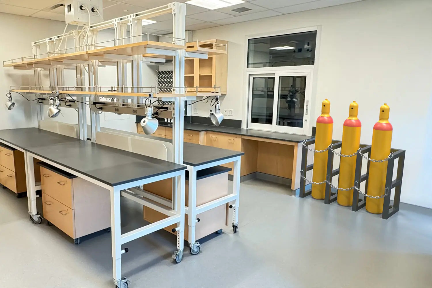 laboratory with lab benches, cabinets, tables and gas cylinder racks
